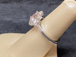 custom rings made in white gold with a morganite center stone surrounded by diamonds